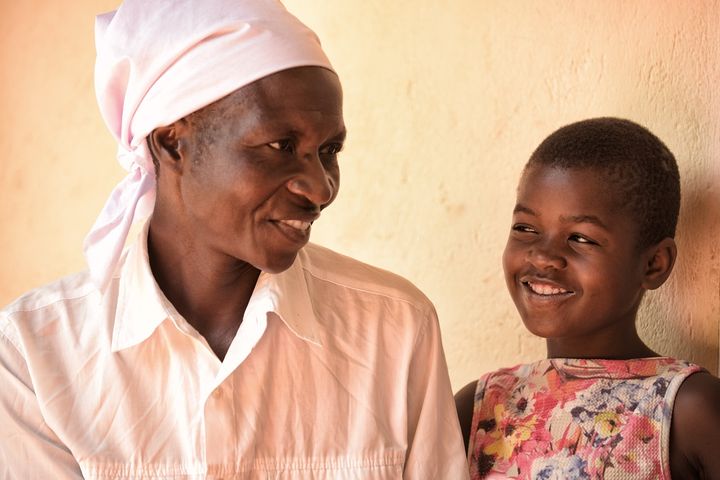 Rosemary Mapingurei with her granddaughter at the Dumbo district health centre in Zimbabwe 