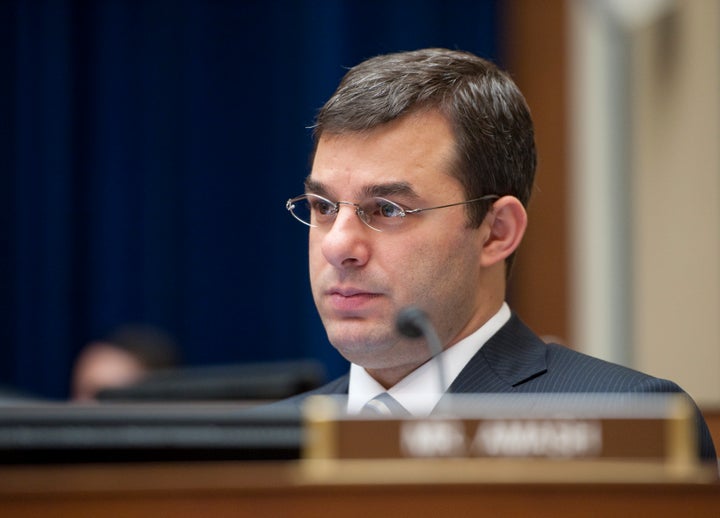 Rep. Justin Amash (R-Mich.) listens during a House Oversight and Government Reform Committee hearing.