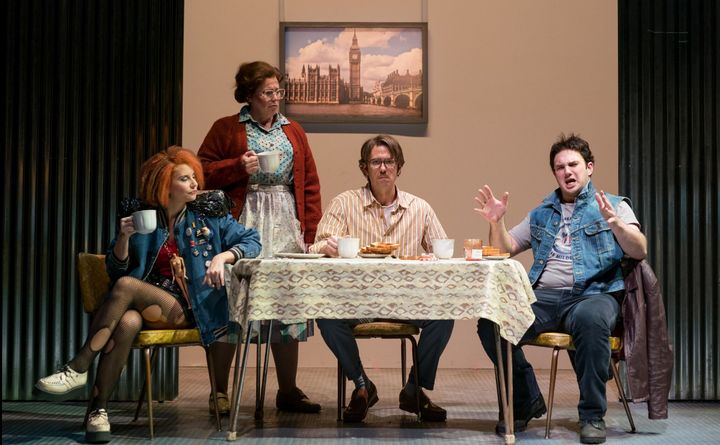(l-r) Amanda Crider, Caroline Worra, Christopher Burchett and Marcus Farnsworth are a normal 1980s family in East End London in the Boston Lyric Opera production of Mark Anthony Turnage’s GREEK.