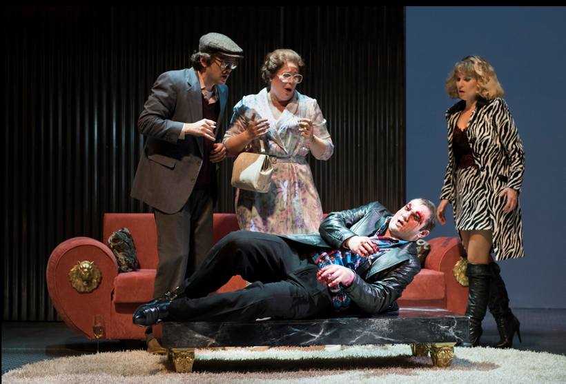 Playing out his apparent Oedipal fate, Eddy (Marcus Farnsworth, on table) reacts to disturbing news by attempting to gouge hi