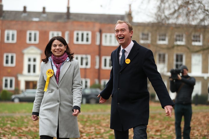 Liberal Democrats leader Tim Farron and MP Sarah Olney greet supporters after her Richmond Park by-election win 