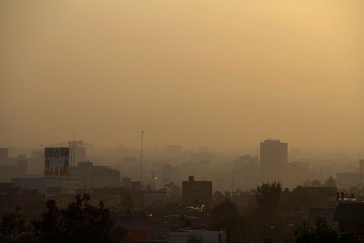 Mexico City is seen through heavy smog in the early morning March 30, 2011.