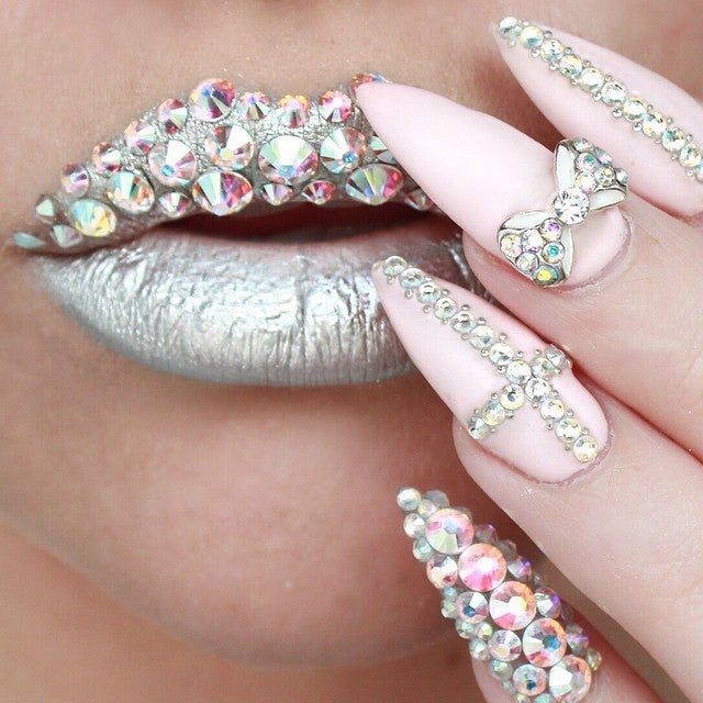<p>Get fancy applying glitz to your painted nails</p>
