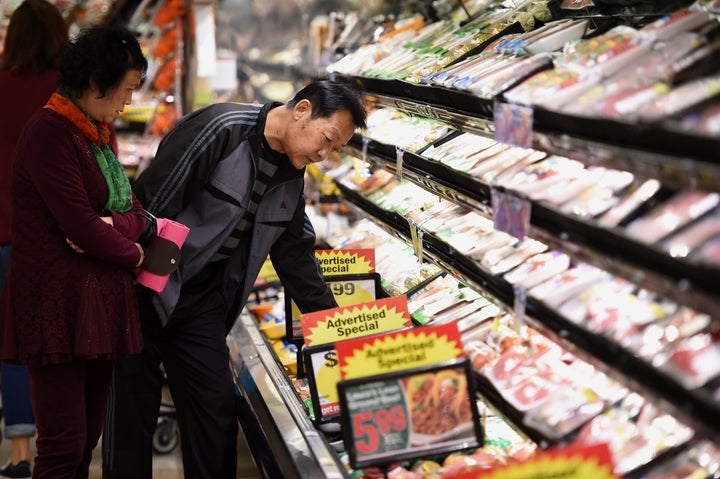 Shoppers at a Ralph's Supermarket in Irvine, California. A new report reveals how polarized Americans are in their beliefs about the food they buy and eat.