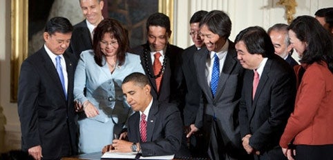 <p><em>President Obama signing legislation to promote diversity and inclusion in Federal Workforce</em></p>