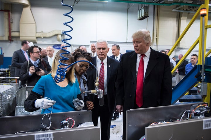 President-elect Donald Trump and Vice President-elect Mike Pence take a tour of Carrier Corporation in Indianapolis, Indiana, on Thursday.