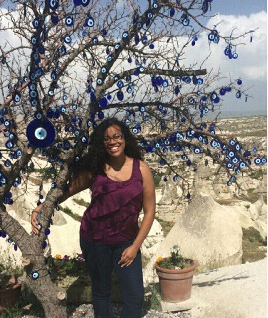 In Cappadocia with a tree covered in evil eye medallions (told you it was my favorite place)