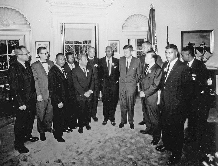 Martin Luther King, Jr. meeting with whites in power to recruit them to fight for his agenda.