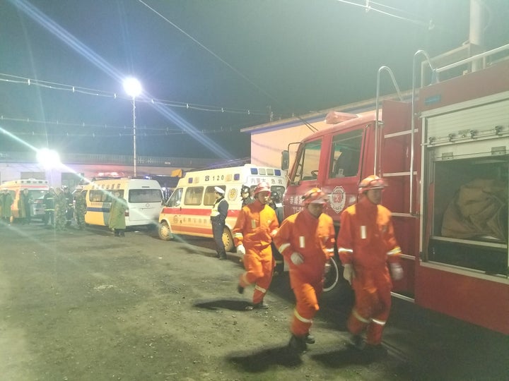 Rescuers work at the site of a coal mine explosion in Chifeng, Inner Mongolia, on Saturday.