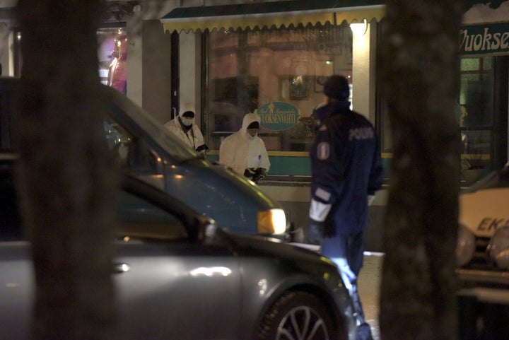 <strong>Police investigators work at the area were three people were killed in Imatra, Finland</strong>