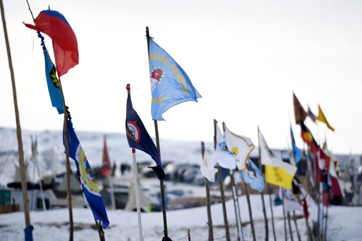 Flags from dozens of nations are on display at Oceti Sakowin Camp on the edge of the Standing Rock Sioux Reservation on Decem