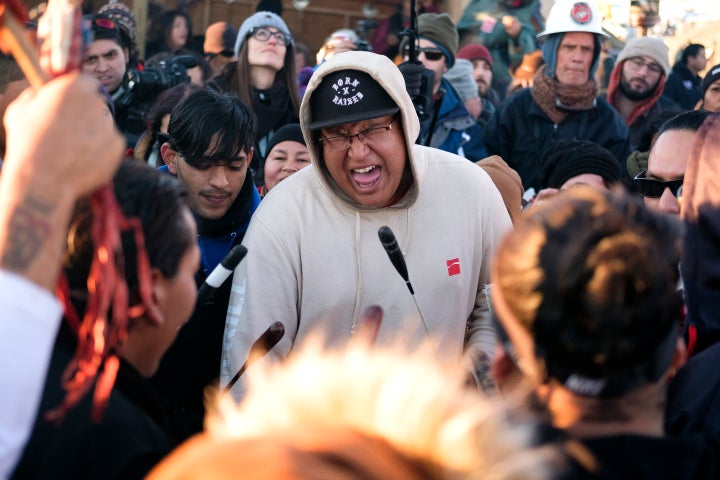 Drummers at the Oceti Sakowin campground perform a victory song.