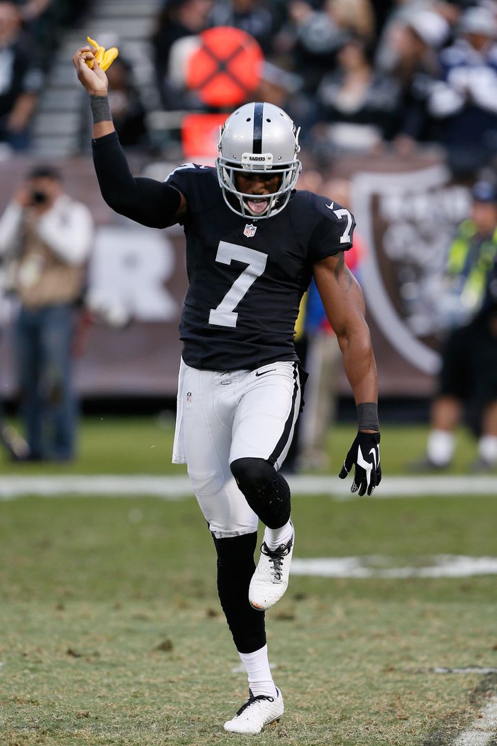 Marquette King dances with the penalty flag during the Oakland Raiders' victory over the Buffalo Bills on Sunday.