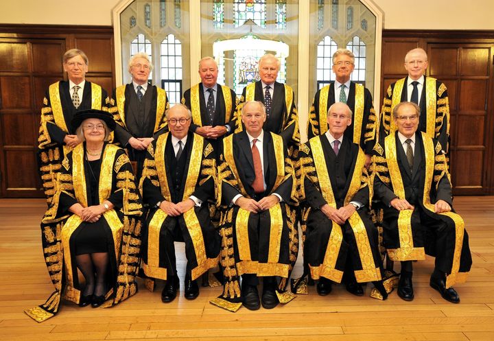 The Lords of the Supreme Court, (back row, left to right) Lord Carnwath, Lord Sumption, Lord Clarke, Lord Kerr, Lord Wilson and Lord Reed, with (front row, left to right) Lady Hale, Lord Hope, Lord Neuberger, Lord Walker and Lord Mance after Lord Neuberger was sworn in as the new President of the Supreme Court in the courts main chamber, in Westminster, central London.