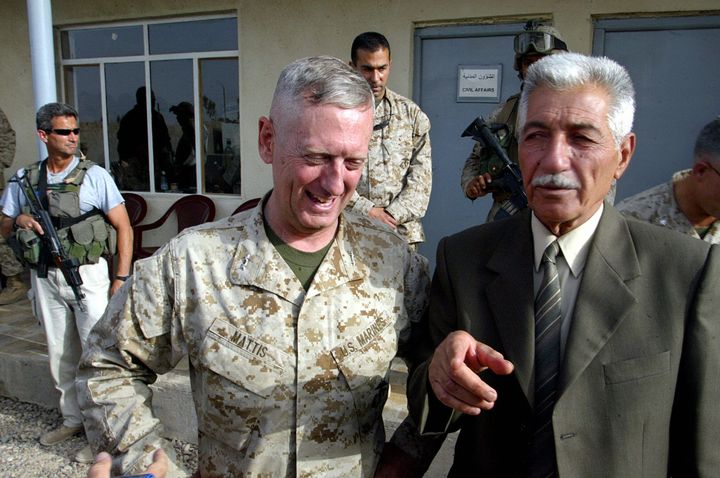 Iraqi General Mohammed Latif (R), head of the Fallujah Brigade, gestures as he stands near US Marines General James Mattis during a joint press conference 20 May at the Fallujah Liaison Team Building, west of Baghdad 20 May 2004.