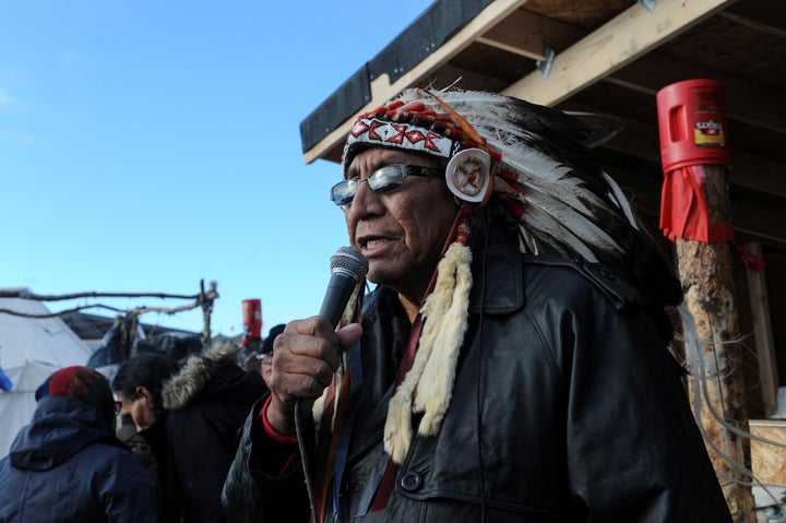 Chief Arvol Looking Horse, a Native American spiritual leader of the Sioux nation, speaks to participants during a ceremony at Oceti Sakowin camp.