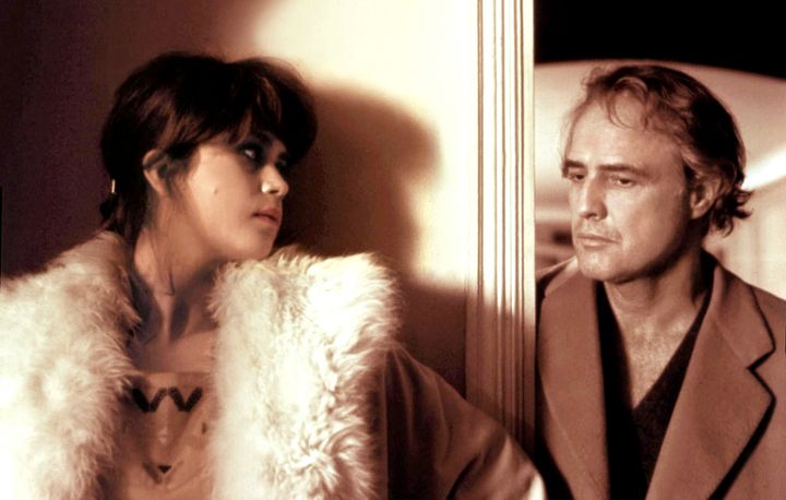 Maria Schneider and Marlon Brando on the set of "Last Tango In Paris." 