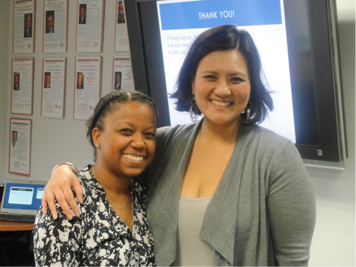 <i>Maung-Gaona congratulates Ph.D. student Felicia Jackson after she gives a “Research Café” presentation<