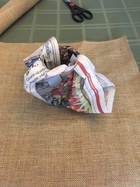 Add recycled newspaper for a bit of protection