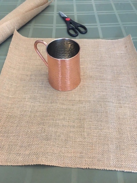 Cut the burlap into a large square