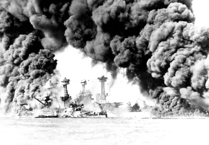 The West Virginia and Tennessee battleships are ablaze after the Pearl Harbor attack Dec. 7, 1941.