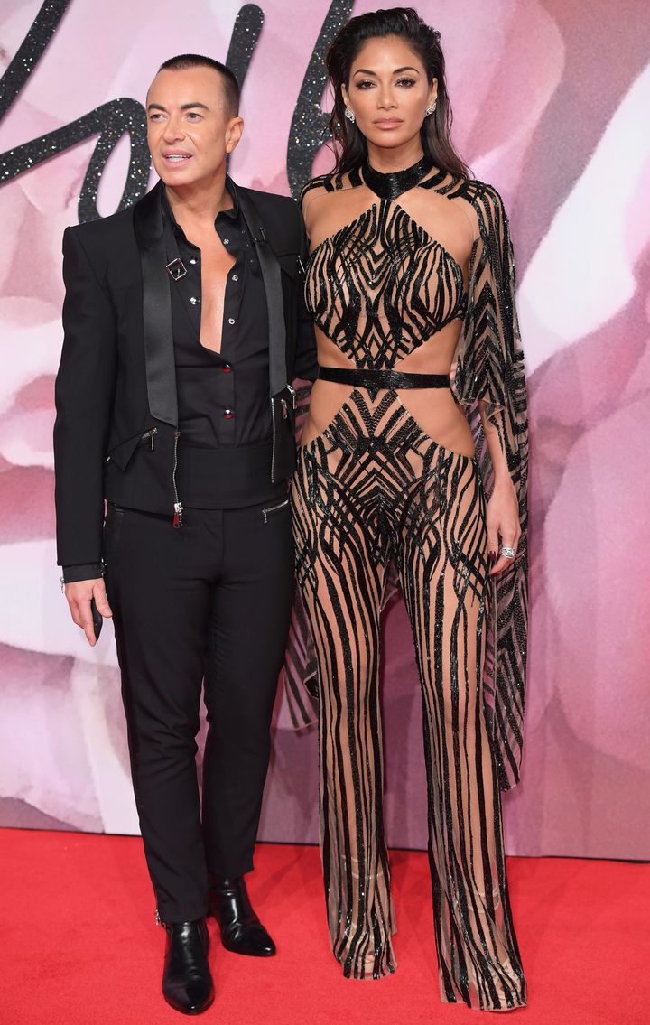 <strong>Nicole with the man responsible for her outfit, designer Julien MacDonald.</strong>
