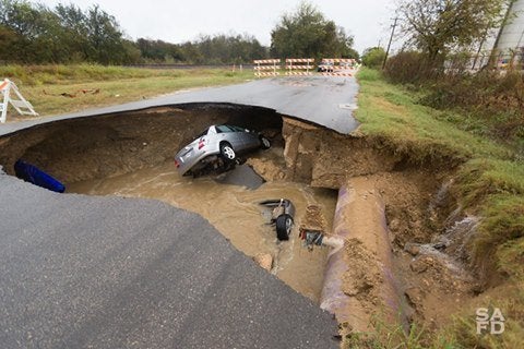 Two cars fell into the 12ft deep waters 