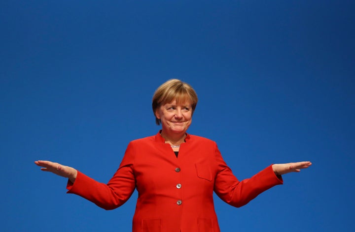 German Chancellor and leader of the conservative Christian Democratic Union party CDU Angela Merkel reacts after her speech a