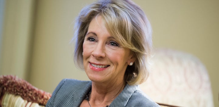 <p>Betsy DeVos, nominee for education secretary, poses for a photo before a meeting with Senate Majority Leader Mitch McConnell, R-Ky., in the Capitol, December 1, 2016.</p>