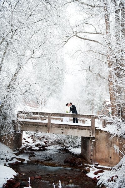 A romantic walk on the bridge in an enchanted forest looks like it’s a scene straight from a fairy tale.