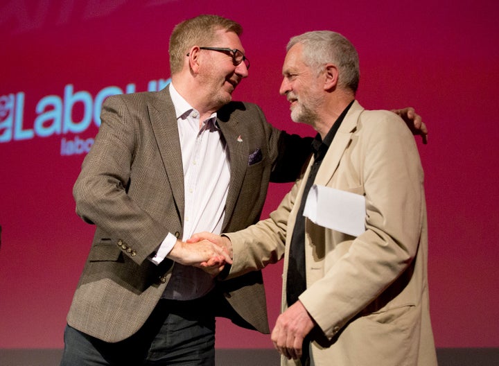 Labour leader Jeremy Corbyn shakes hands with General Secretary of Unite, Len McCluskey.