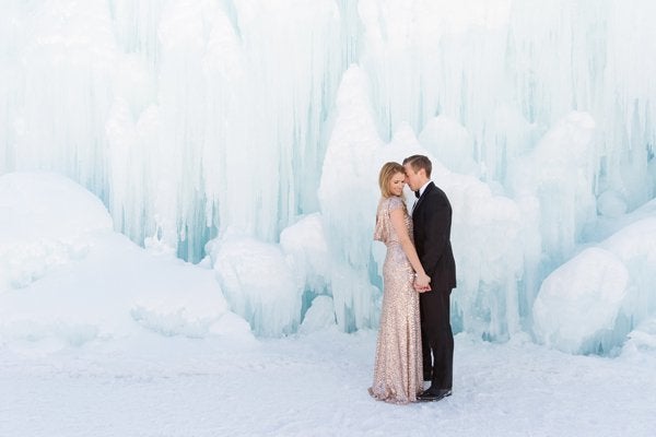 <p>This ice castle is channeling some serious Elsa vibes. Icicles and a gold sequin dress make for a <a href="http://www.bridalguide.com/planning/the-details/photo-video/new-must-have-wedding-photos" target="_blank">unique wedding photo</a>. </p>