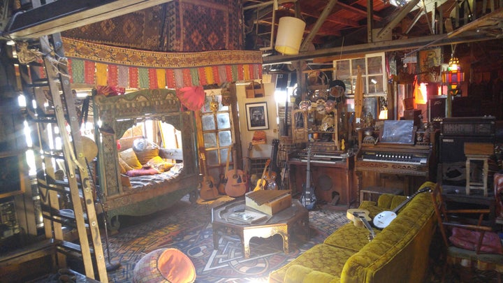 Photo of interior of Oakland Ghost Ship from <a href="http://www.oaklandghostship.com/" target="_blank">Oakland Ghost Ship t