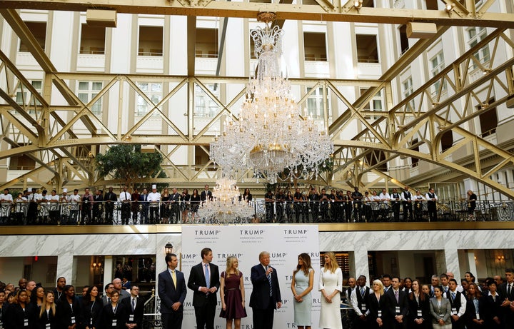 (L-R) Donald Trump Jr., Eric Trump, Tiffany Trump, Donald Trump, Melania Trump and Ivanka Trump attend an official ribbon cut