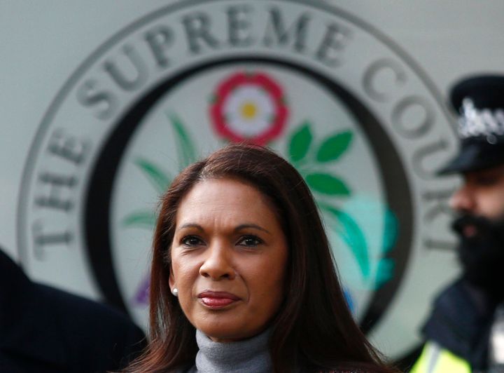 A man has been arrested on suspicion of racially aggravated malicious communications over threats made online to Gina Miller 
