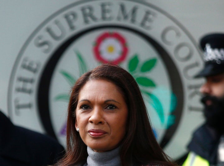 A man has been arrested on suspicion of racially aggravated malicious communications over threats made online to Gina Miller 