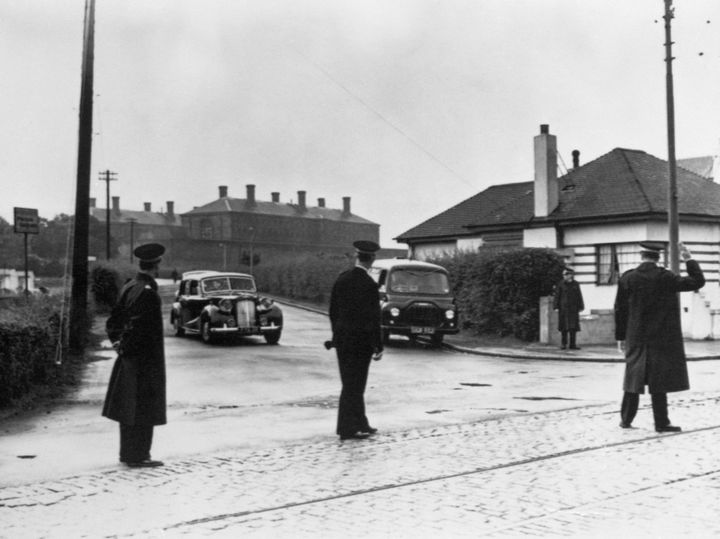 Magistrates cars are seen leaving Barlinnie Prison, Glasgow, after the execution of Manuel