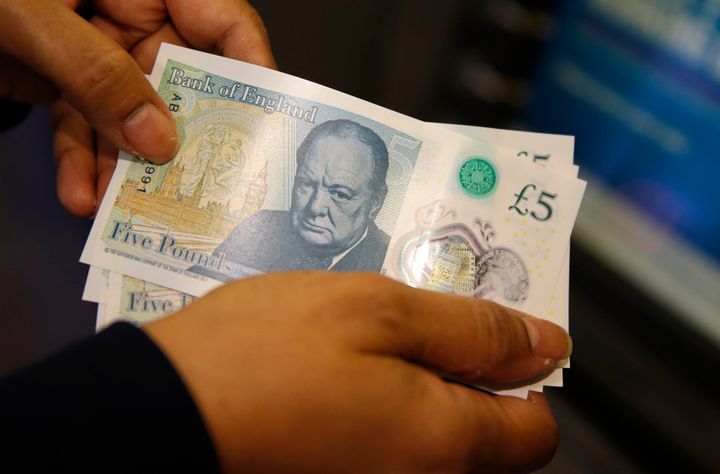 Four lucky people could be carrying around new £5 notes that are worth thousands of pounds