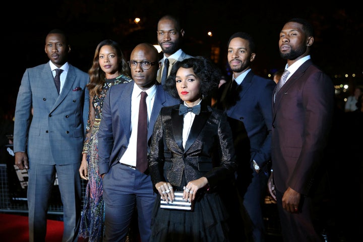 Cast members pose as they arrive for the gala screening of the film "Moonlight", on the second night of the 60th British Film Institute.