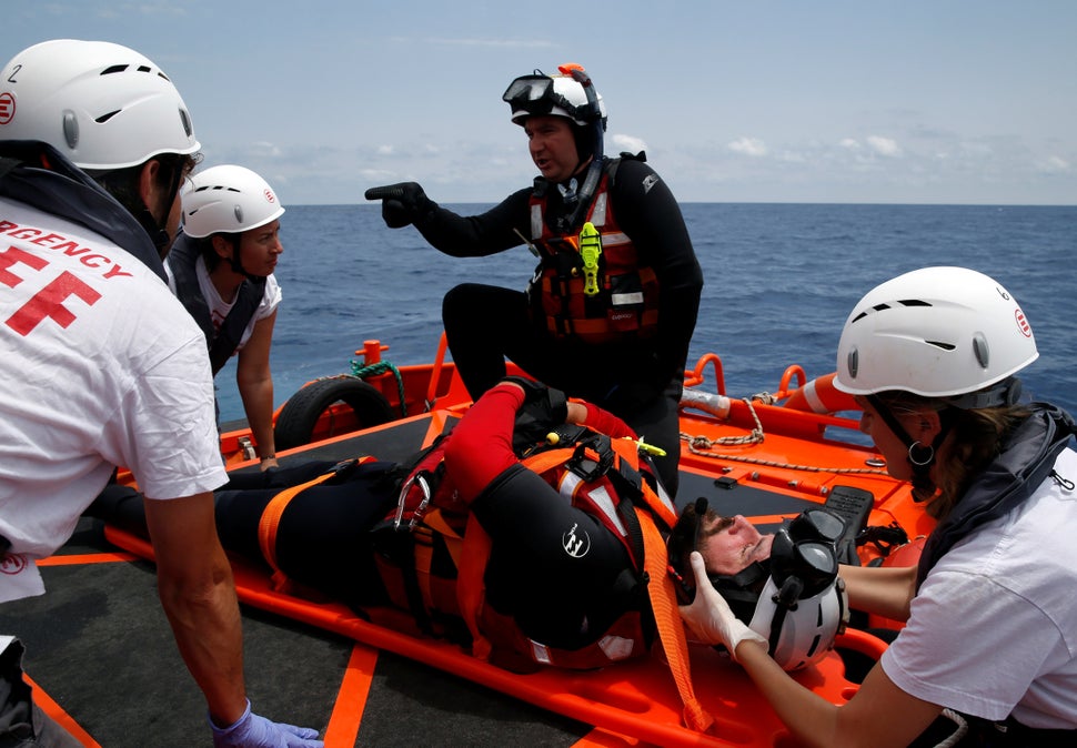 Rescuers with the Migrant Offshore Aid Station (MOAS) take part in a training exercise in order to respond to ships in distre