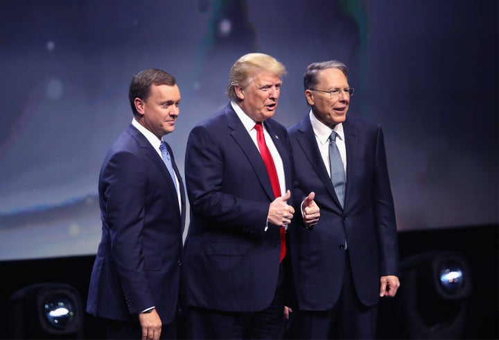 Republican presidential candidate Donald Trump is introduced with Chris Cox (L), Executive Director of the NRA Institute for Legislative Action and Wayne LaPierre (R), Executive Vice President of the National Rifle Association, at the National Rifle Association's NRA-ILA Leadership Forum during the NRA Convention at the Kentucky Exposition Center on May 20, 2016 in Louisville, Kentucky.