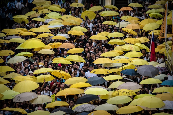 Pro-democracy demonstrators and activists gather outside government headquarters in Hong Kong on Sept. 28, 2015.