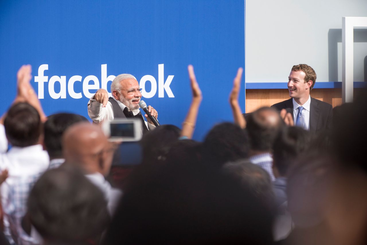 Narendra Modi, India's prime minister, speaks with Mark Zuckerberg, chief executive officer of Facebook, in Menlo Park, California on Sept. 27, 2015.