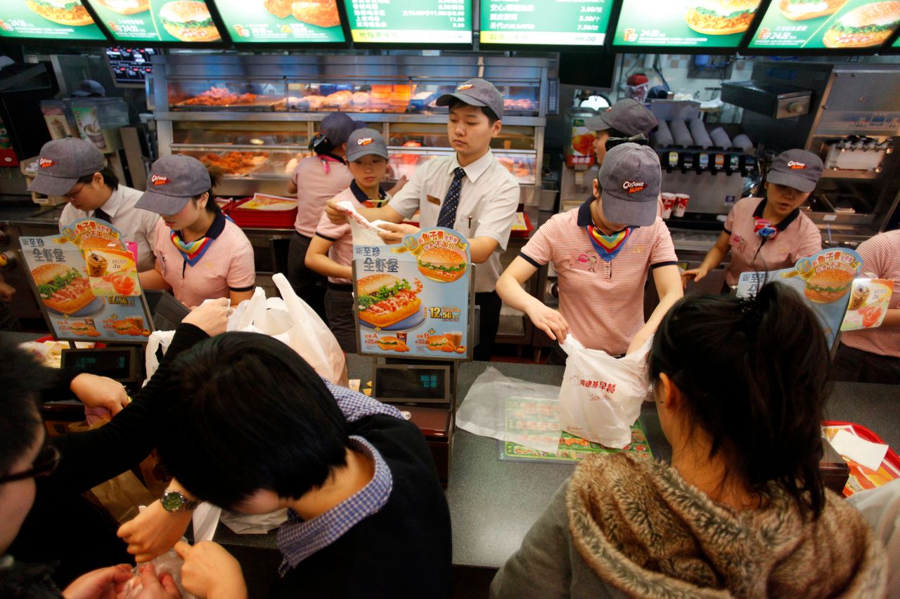 Diners eat at a KFC restaurant in Shanghai, China on Wednesday, Nov. 24, 2010.