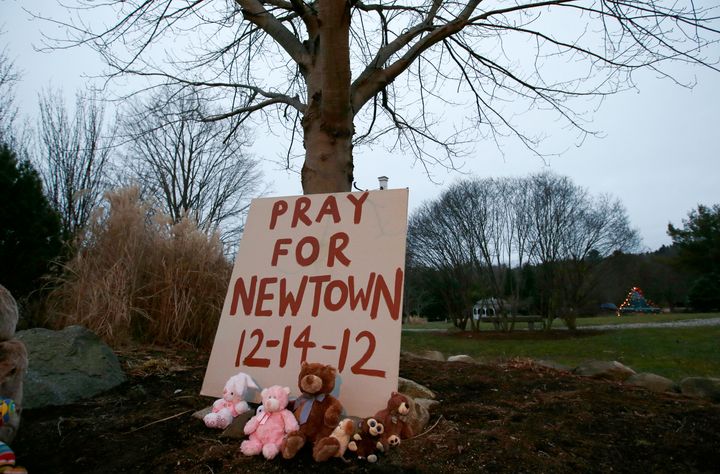 A Florida woman is accused of sending death threats to a parent who lost his son in the 2012 massacre at Sandy Hook Elementary in Newtown, Connecticut.