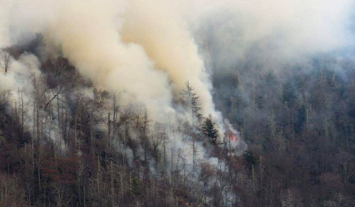 Smoke plumes from wildfires are shown in the Great Smoky Mountains near Gatlinburg, Tennessee, on Nov. 28, 2016.