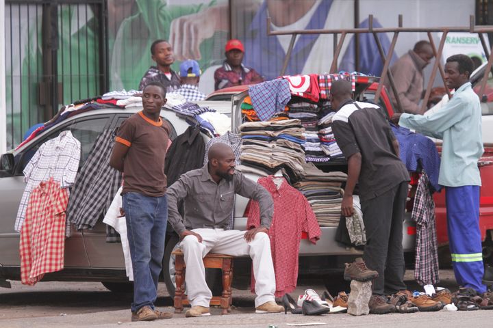 Zimbabwean street vendors hawk their goods.