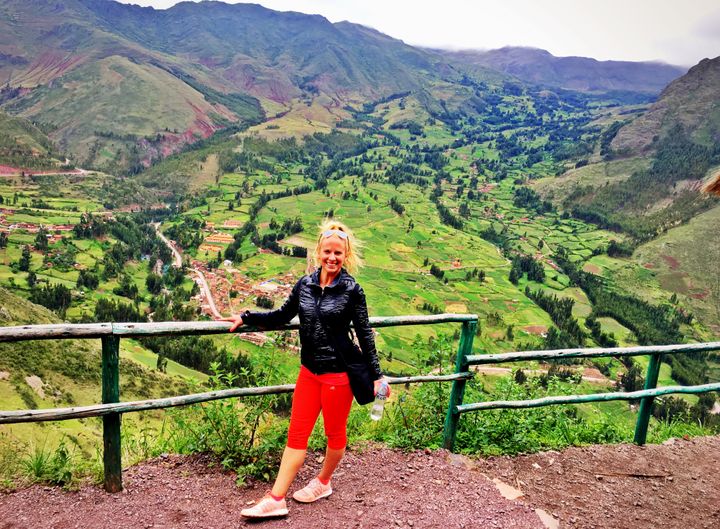 <p>Traveling solo as a blonde, high above the Inca ruins in Pisac, Peru</p>