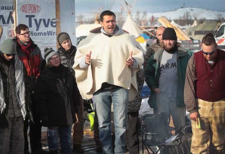 Wes Clark Jr., co-coordinator of #VeteransForStandingRock, briefs military veterans on camp rules and their mission.