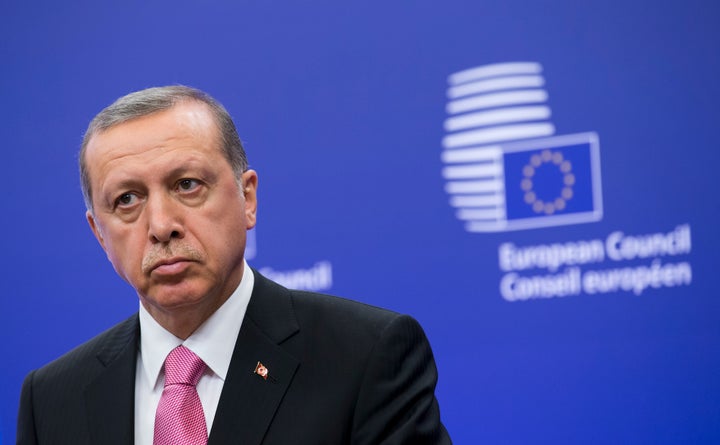 President Erdogan attending the press conference at the Council of European Union.